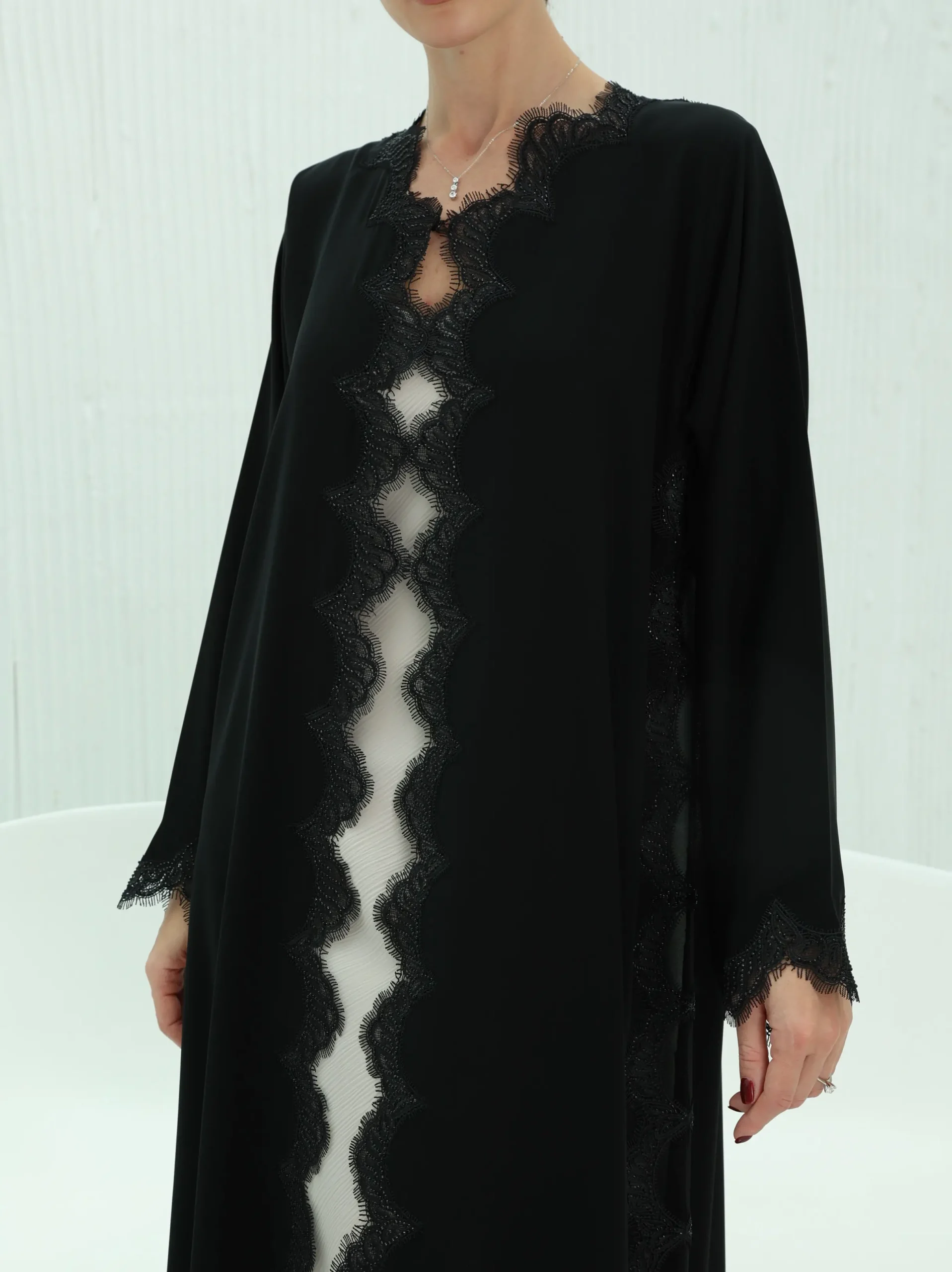 model wearing wave cut abaya
